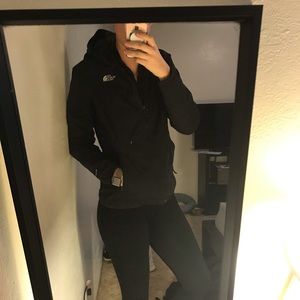 Black North Face rain jacket